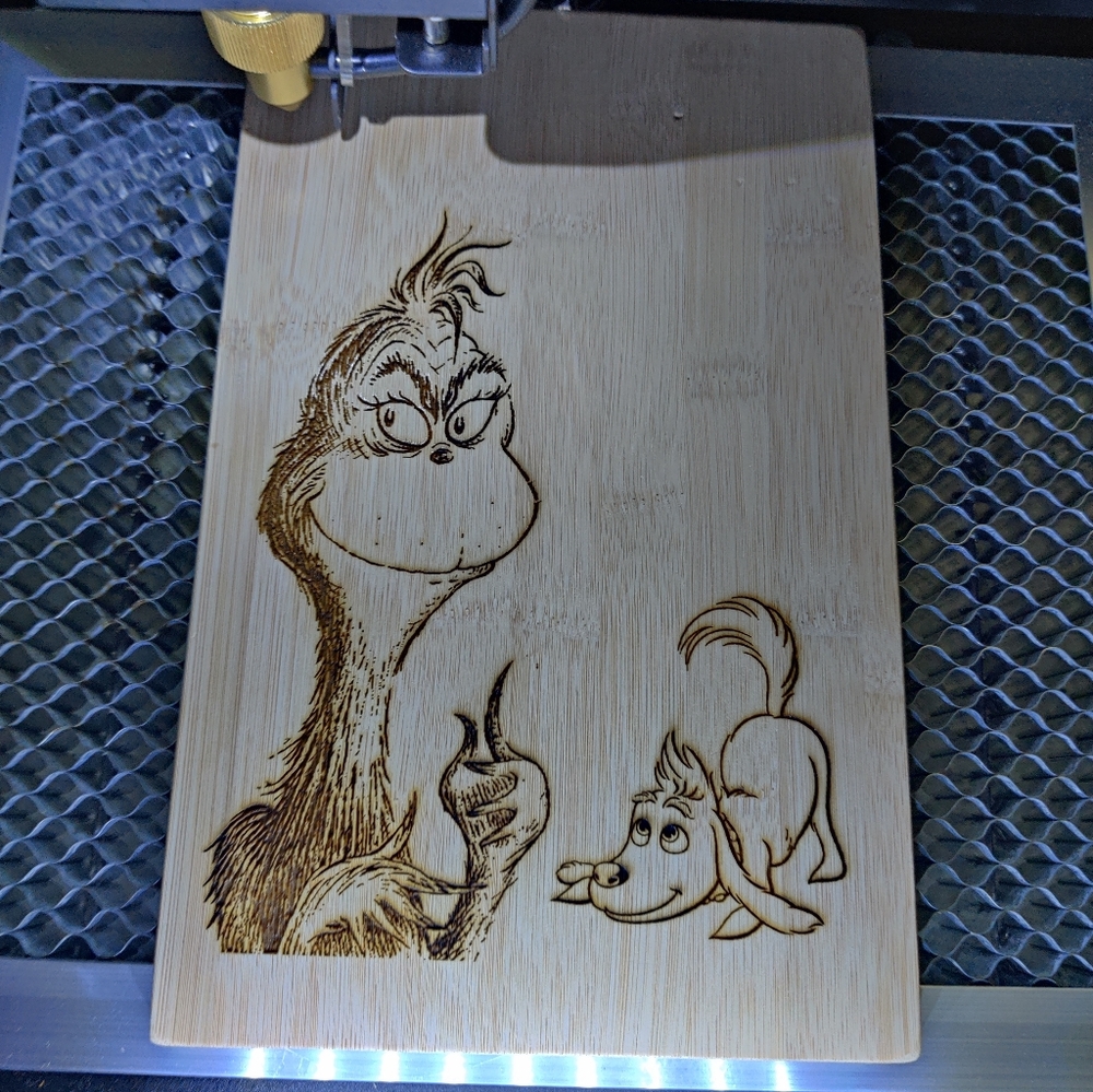 Grinch and Max cutting board